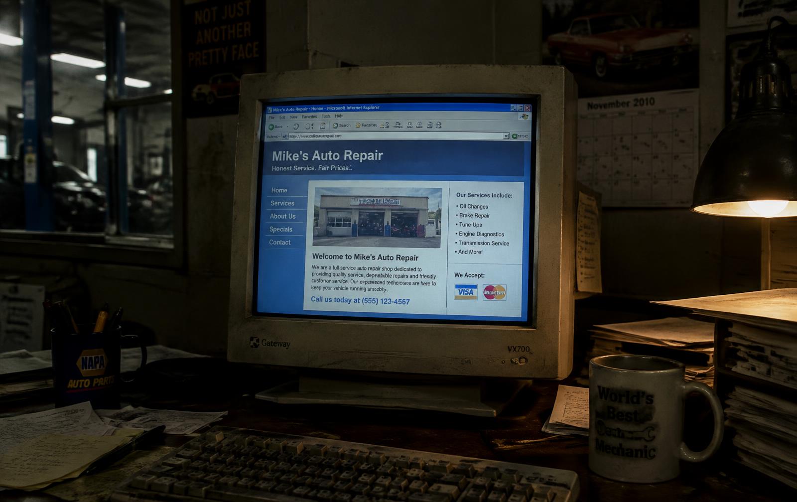 Dusty old monitor showing a dated website in a shop office